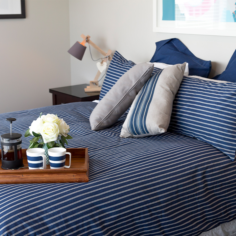 Bedroom with blue bedding
